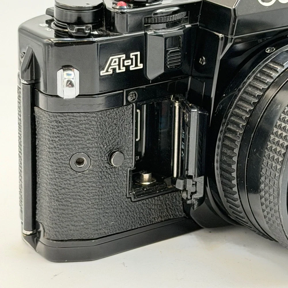 Canon A-1 35mm Film SLR Camera with FD 50mm 1:1.8 Lens, Filter, Cap Black TESTED